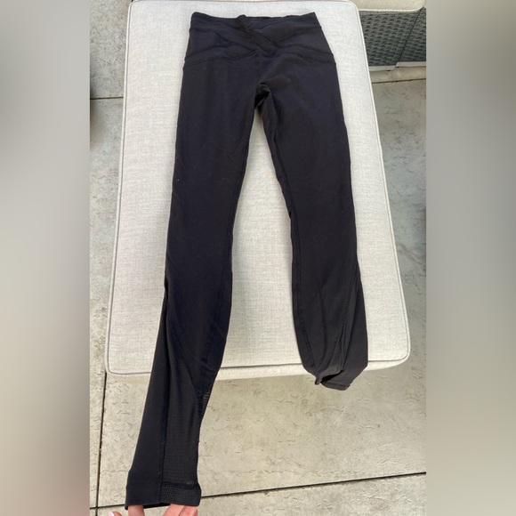 Black lululemon leggings, with mesh cut outs on bottom - Picture 5 of 5